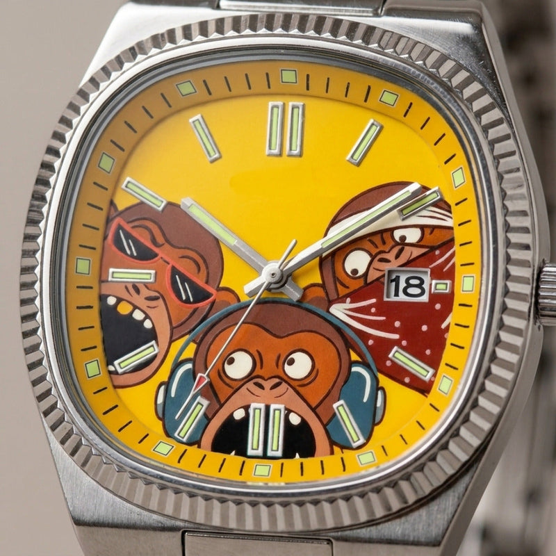 BANDA – watch with a yellow dial and three monkeys, dial close-up