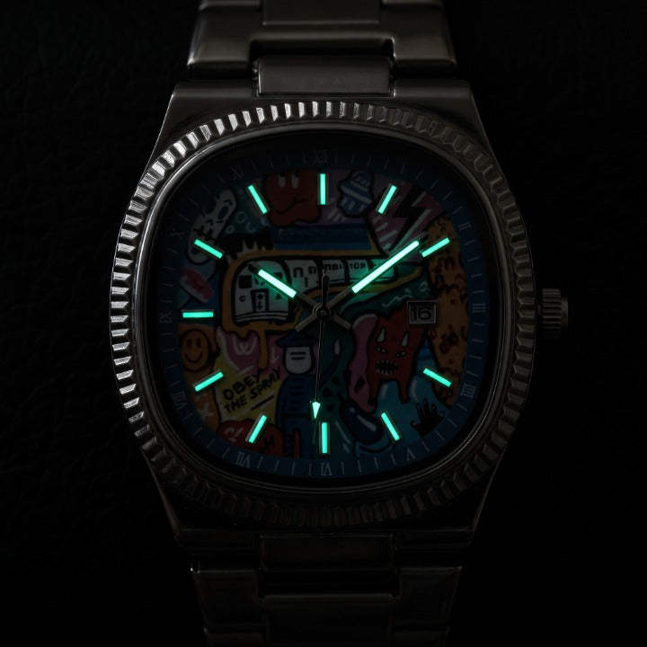 GRAFFITO Plateado – reloj con esfera pintada de arte urbano, índices luminosos en la oscuridad