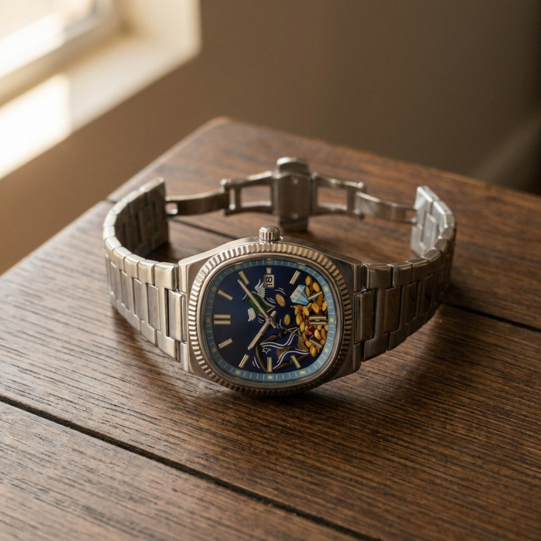 TESORO – watch with a blue dial and golden treasure, dial and butterfly clasp